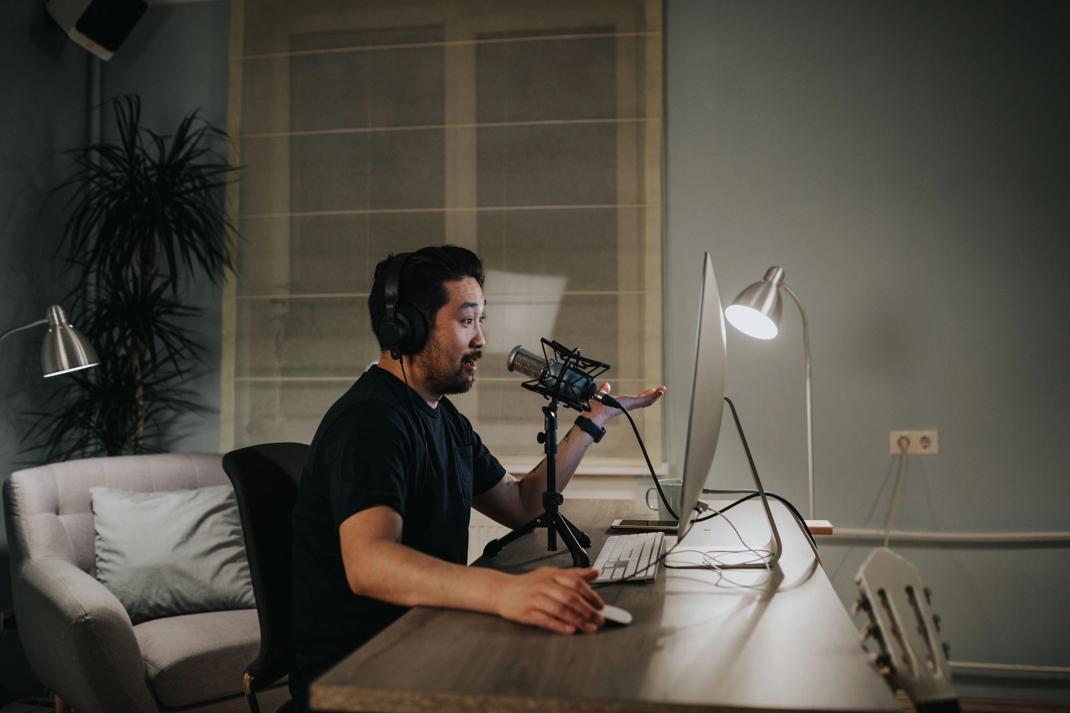 Professional podcaster in a home studio creating exclusive content