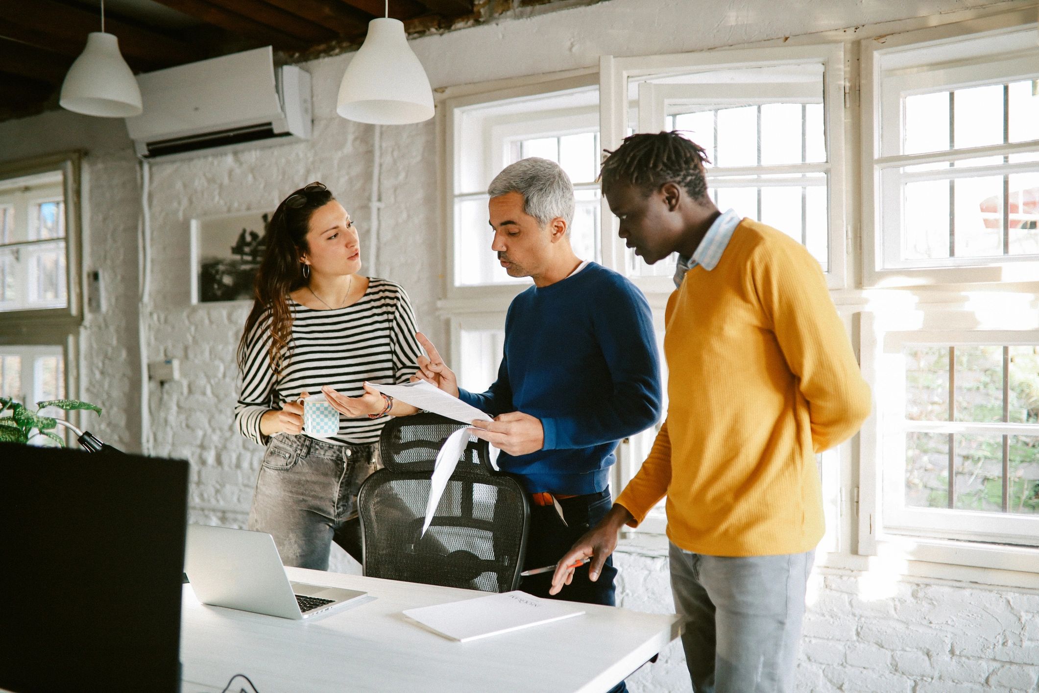 Creative professionals collaborating in a modern office