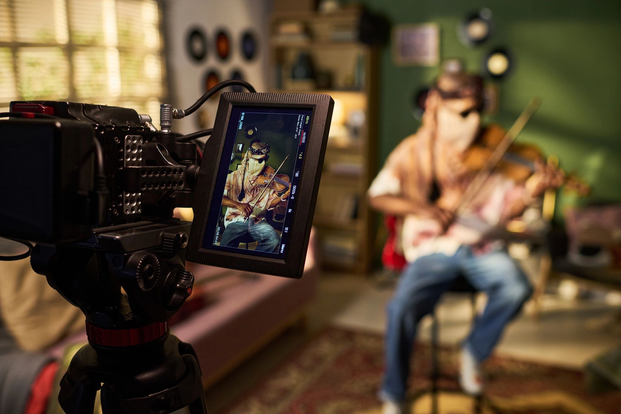 Creator filming premium video content in a studio