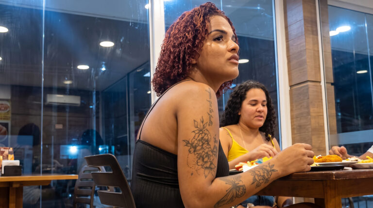 Candid Feet – Two Girls Dining at a Burger Restaurant