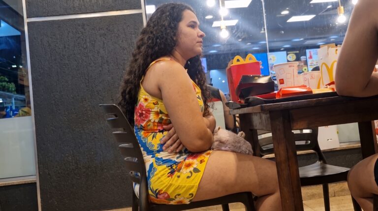 Natural Candid Feet of Two Girls Eating Burgers