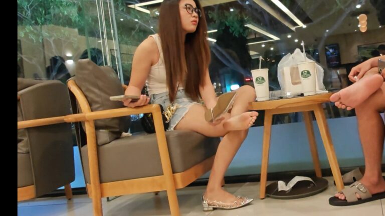 Candid shoeplay dangling shoes