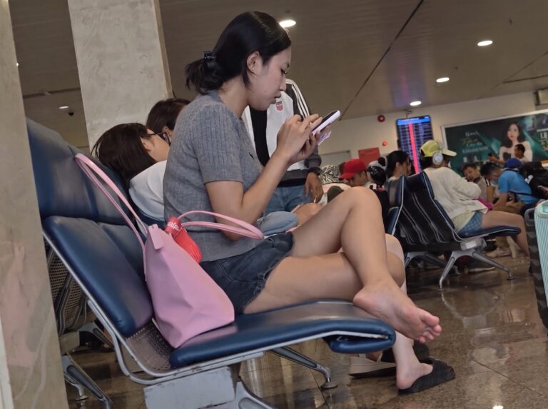 candid feet shoeplay in airport